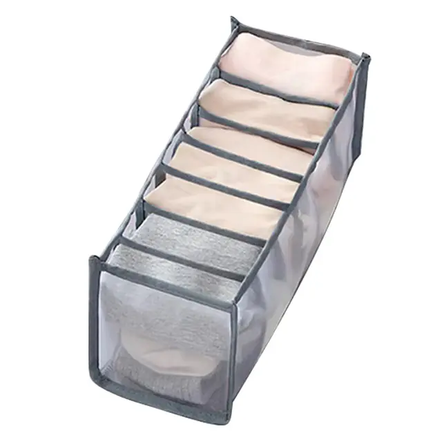 Clothes organiser with multiple compartments for neatly storing underwear, socks, bras, and scarves in drawers.