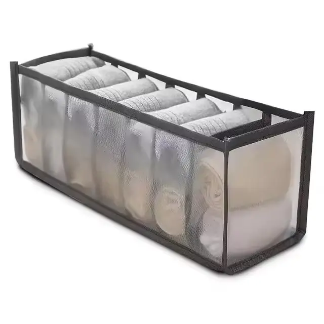 Clothes organiser with multiple compartments for neatly storing underwear, socks, bras, and scarves in drawers.